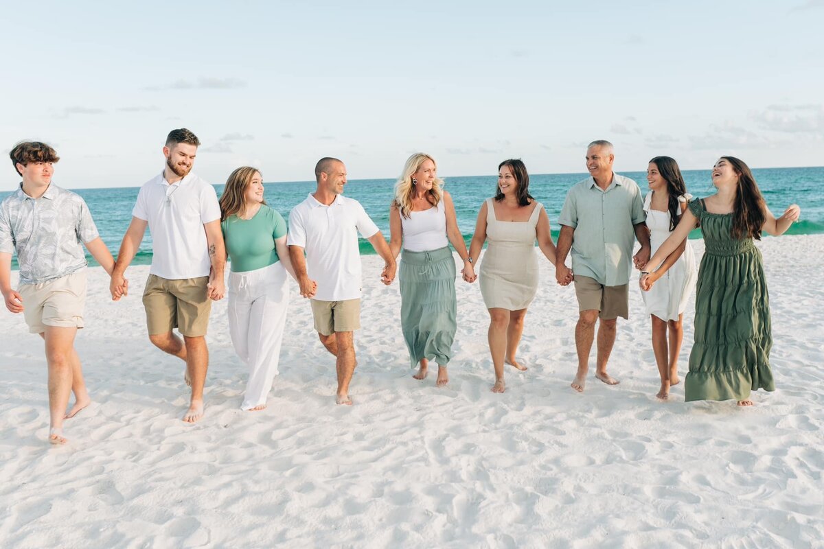 extended family walking on Pensacola beach