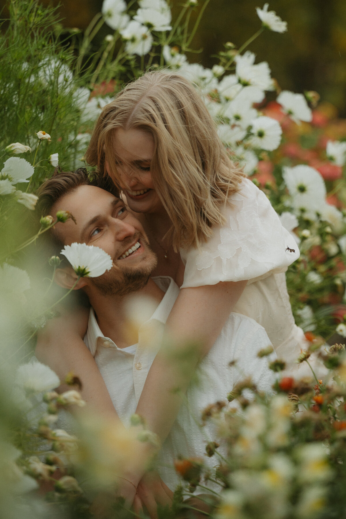Photograph of Edmonton couple in field of flowers