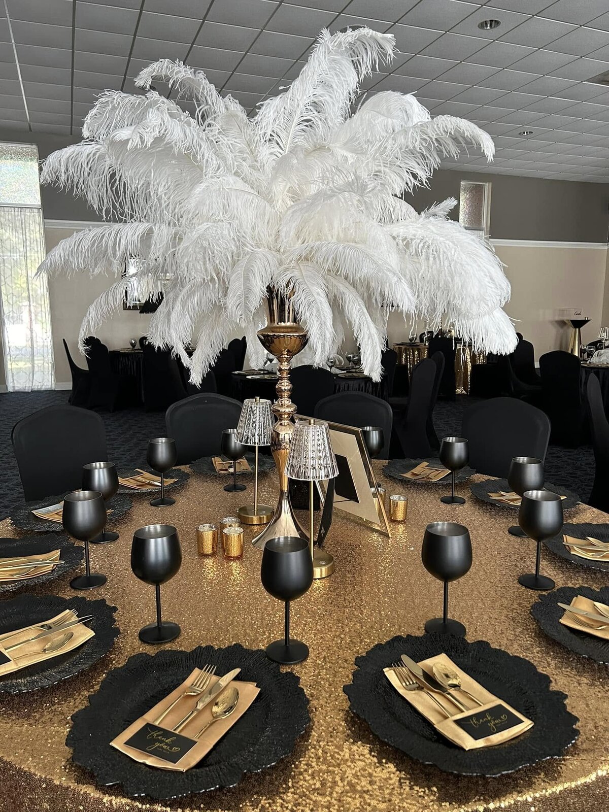harlem-nights-retirement-party-table-white-feathers