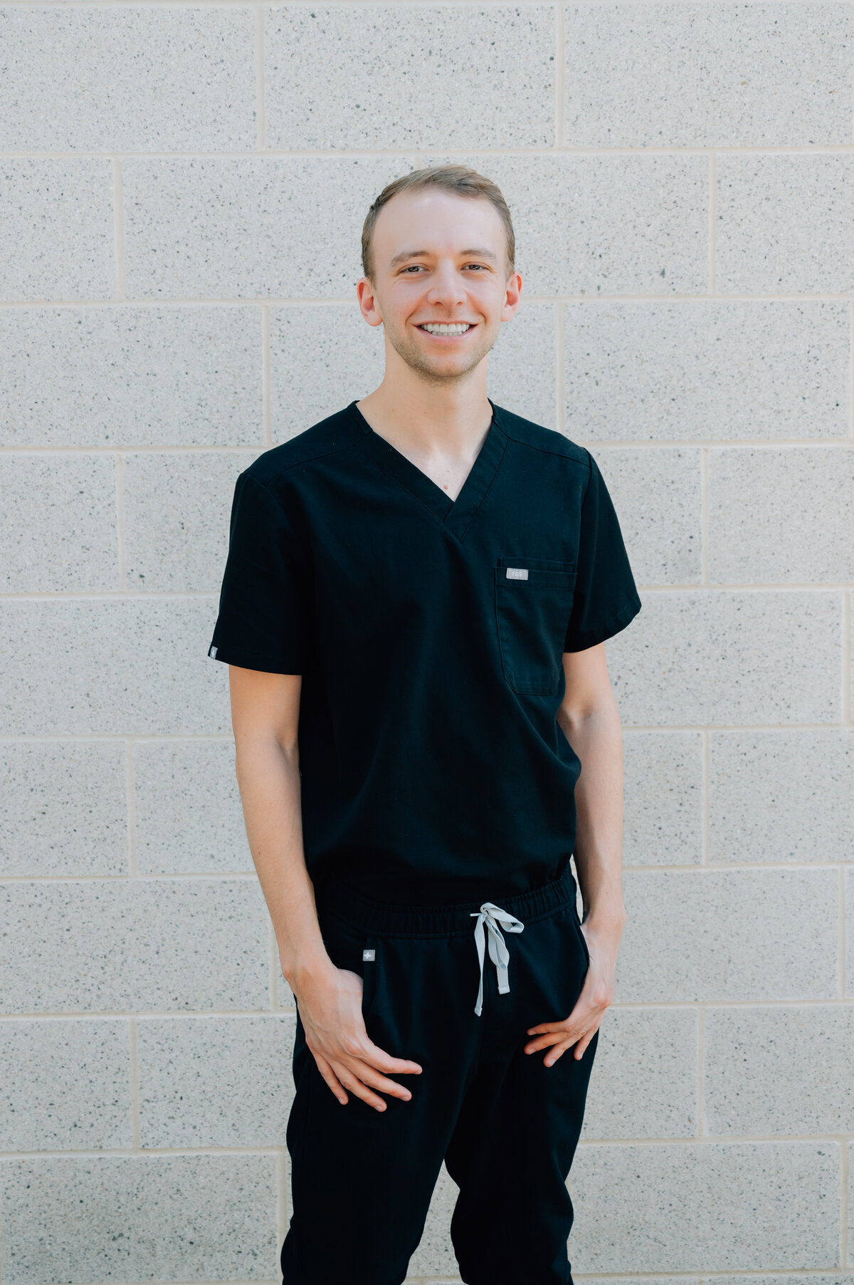 Male doctor branding portrait at clinic, taken by Houston healthcare photographer