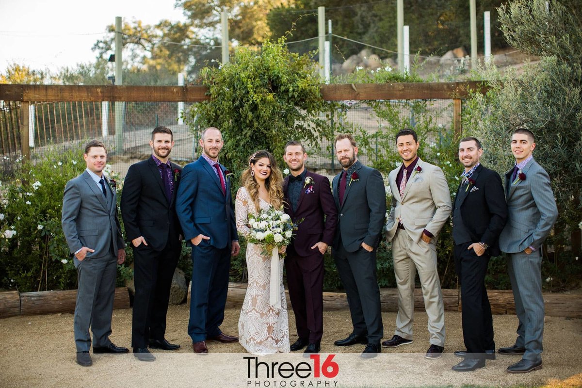 Couple with the groomsmen