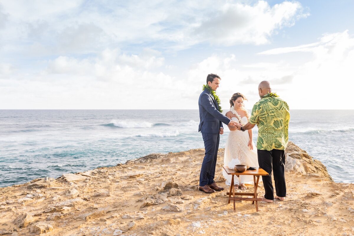 Kauai Wedding Photographer capturing wedding cliffside