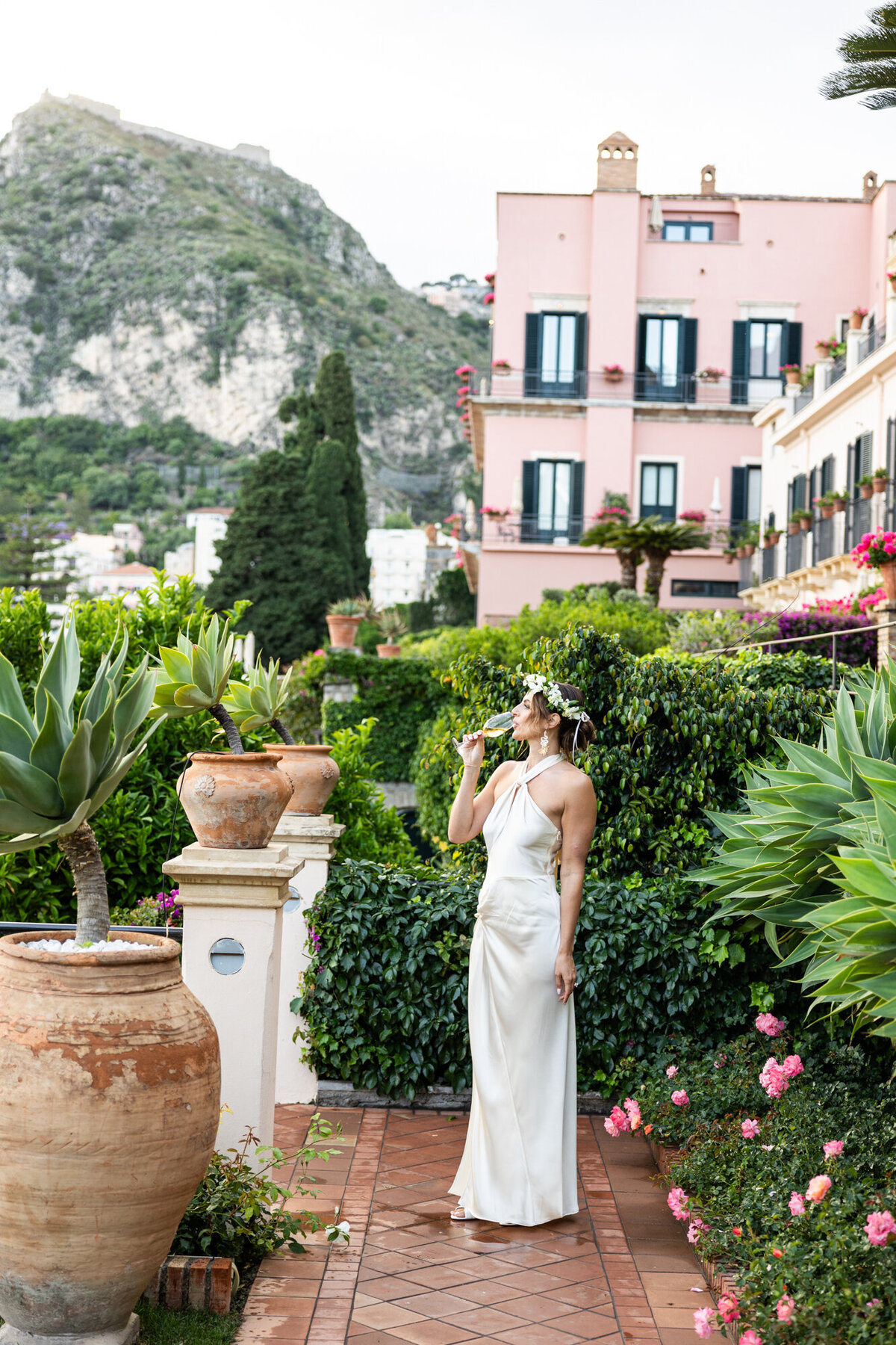 Bride sipping a refreshing drink