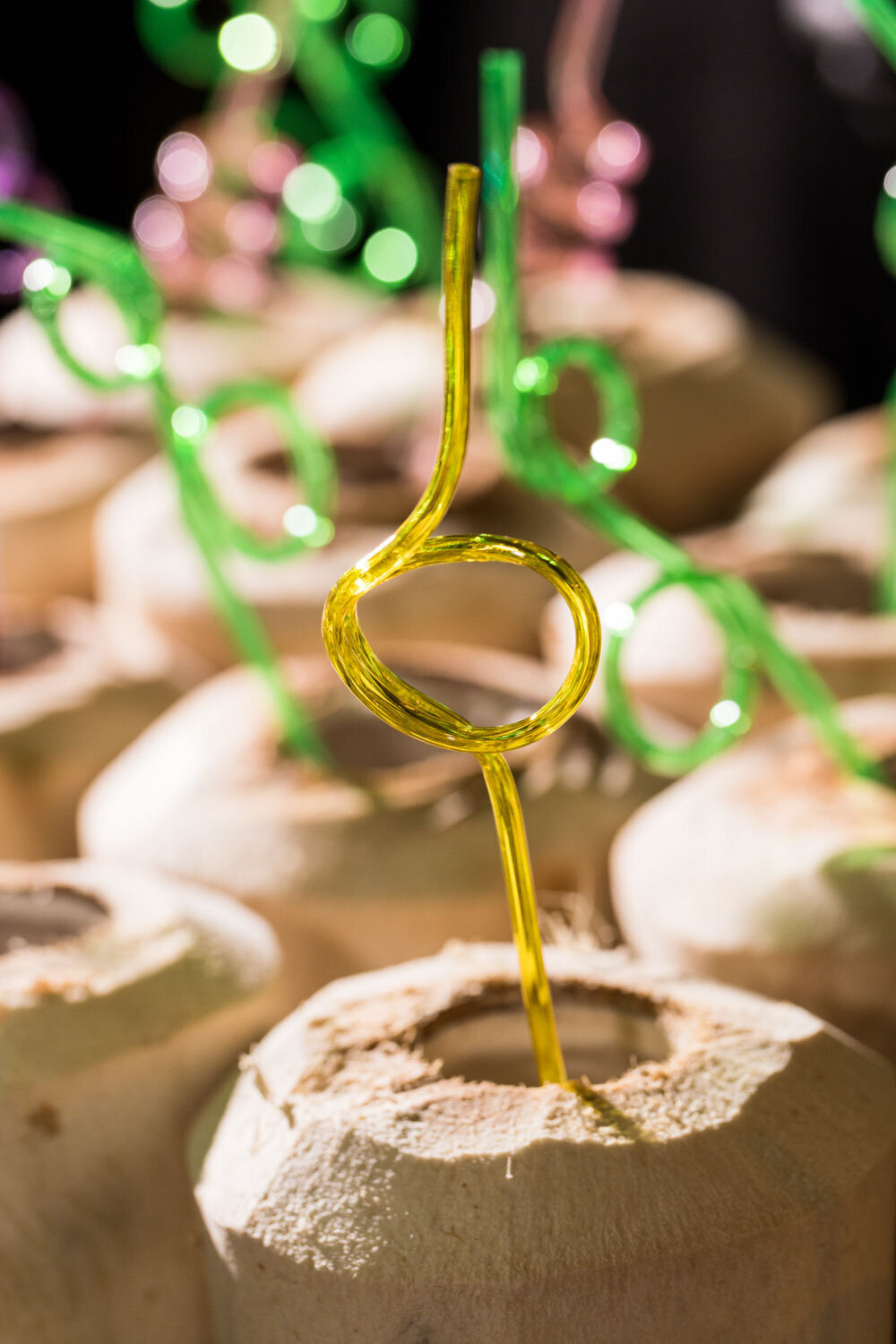 Coconut drink with colorful straw