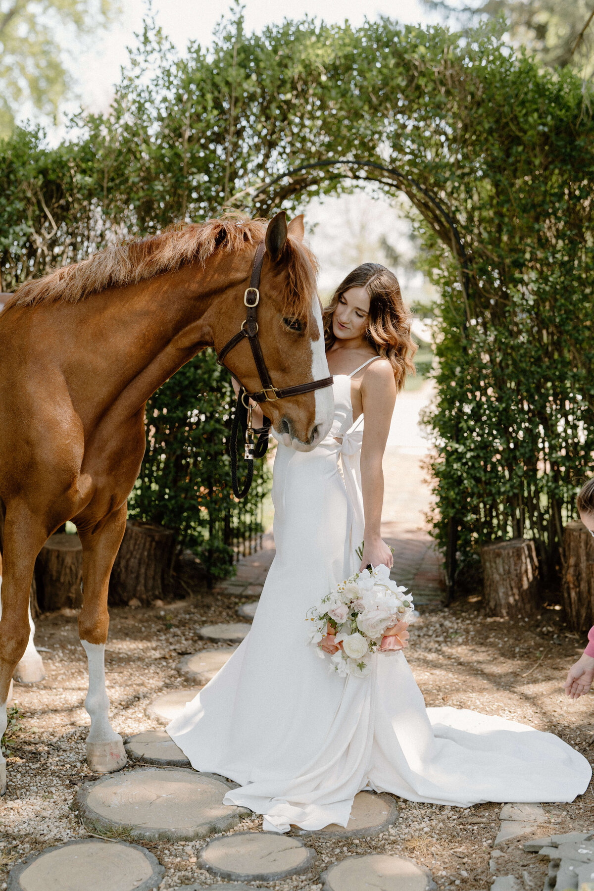 Bride with a horse at at white chimneys estate wedding, Lancaster, PA