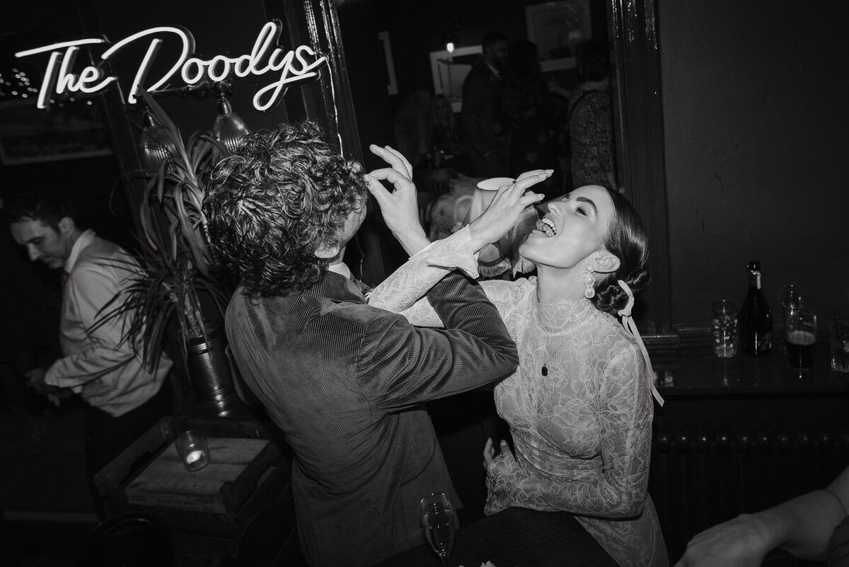 Wedding photographer captures couple taking a stroll hand in hand at their french chateau wedding.