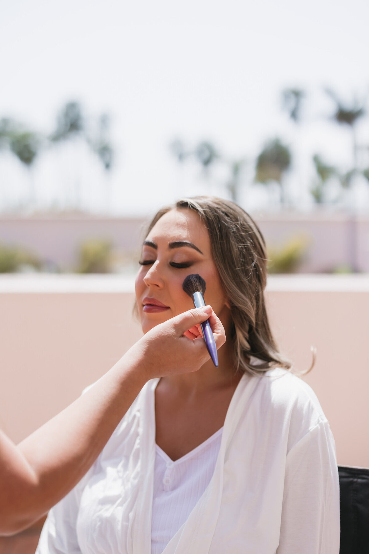 Bride getting ready for wedding day at Hilton Beachfront Resort Santa Barbara