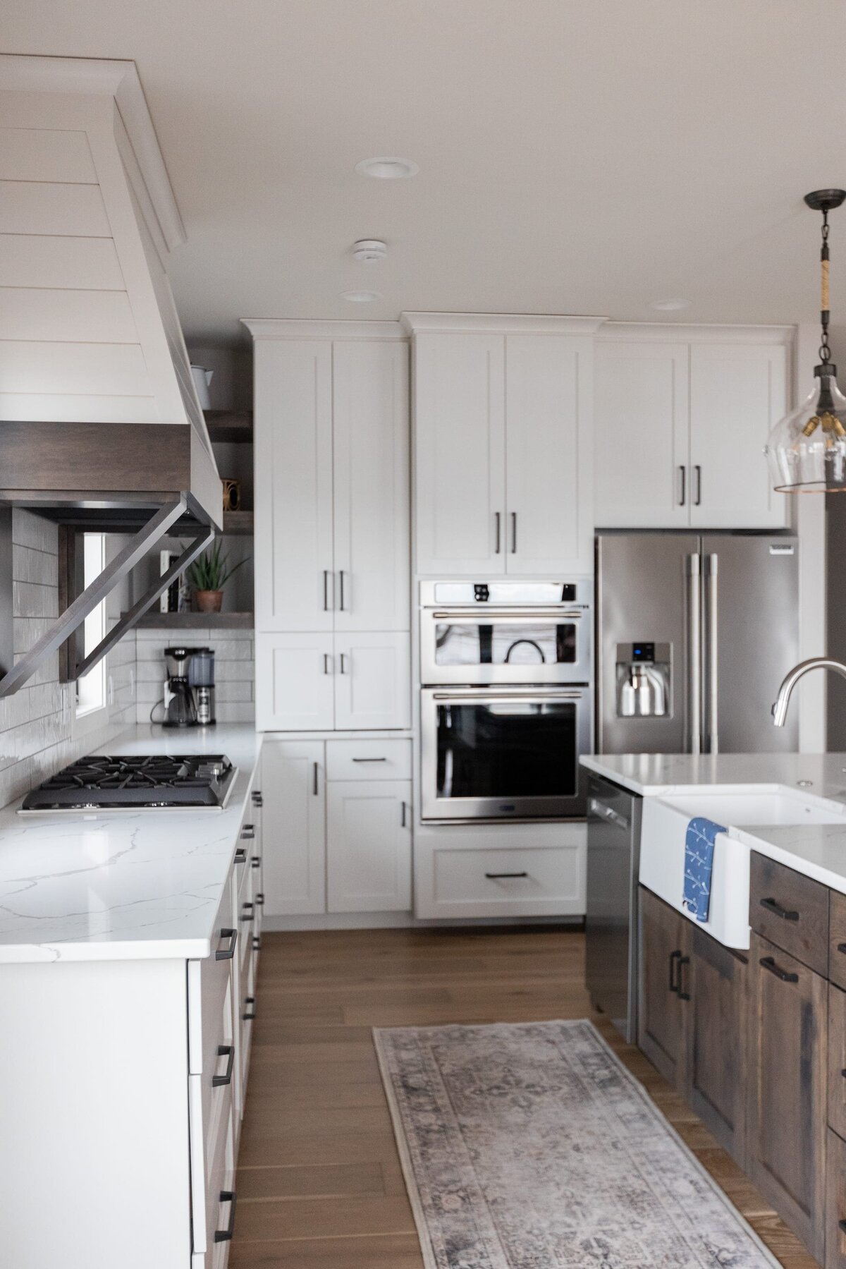 michele rosenboom design modern farmhouse kitchen with white cabinet and runner rug