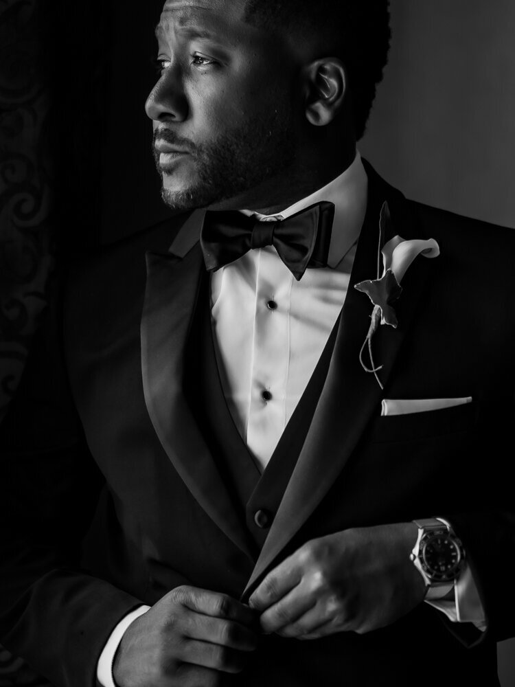 window light portrait of groom