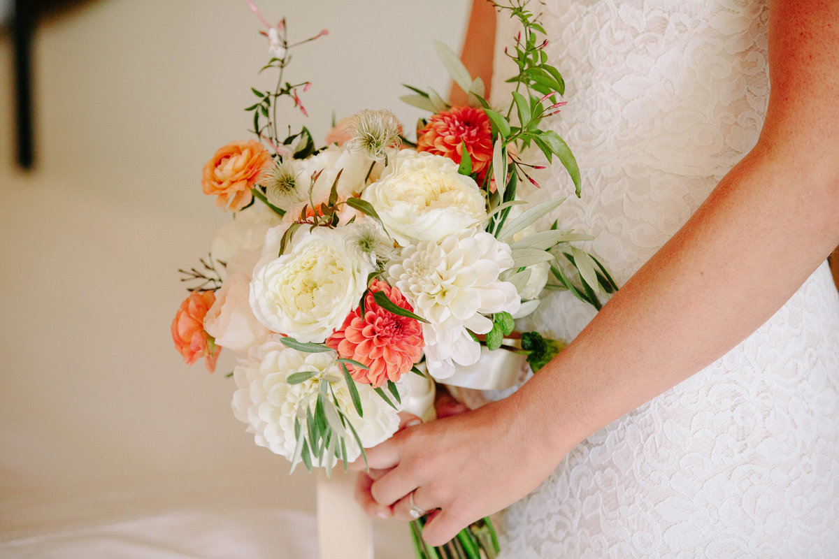 Peach and white bridal bouquet for a wedding at Beltane Ranch in Sonoma.