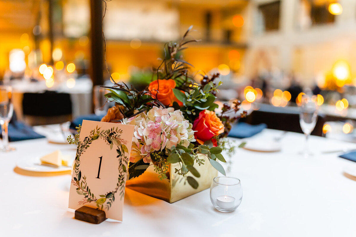 centerpiece-table-number-floral-roses-eucalyptus
