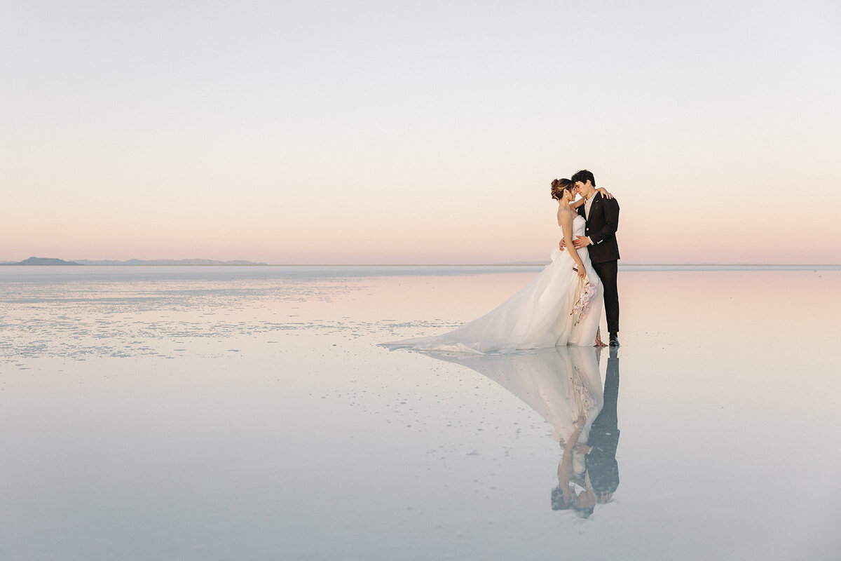 Utah Wedding Photography capturing bride and groom hugging