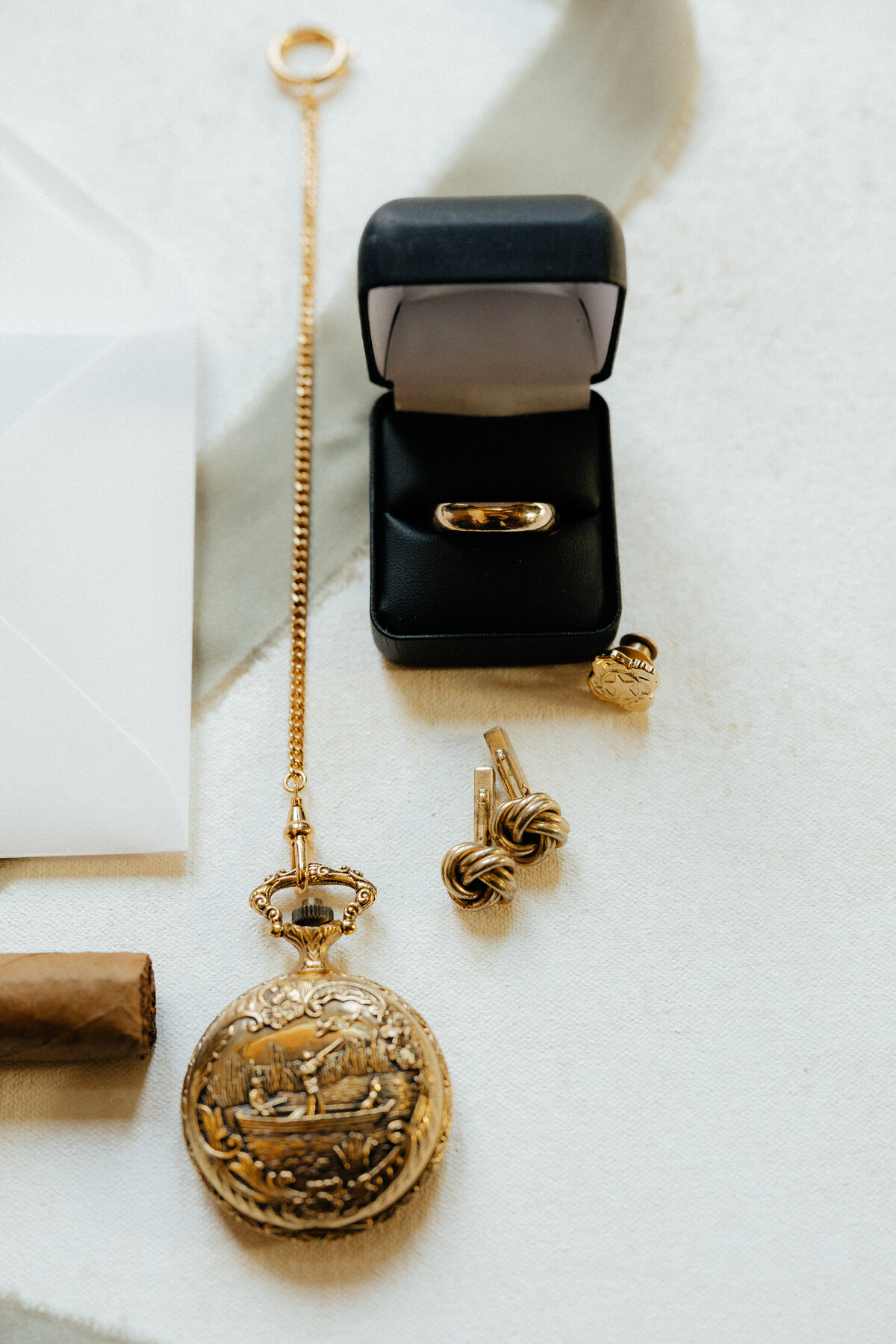 A classy wedding flat lay at a Custer State Park wedding.