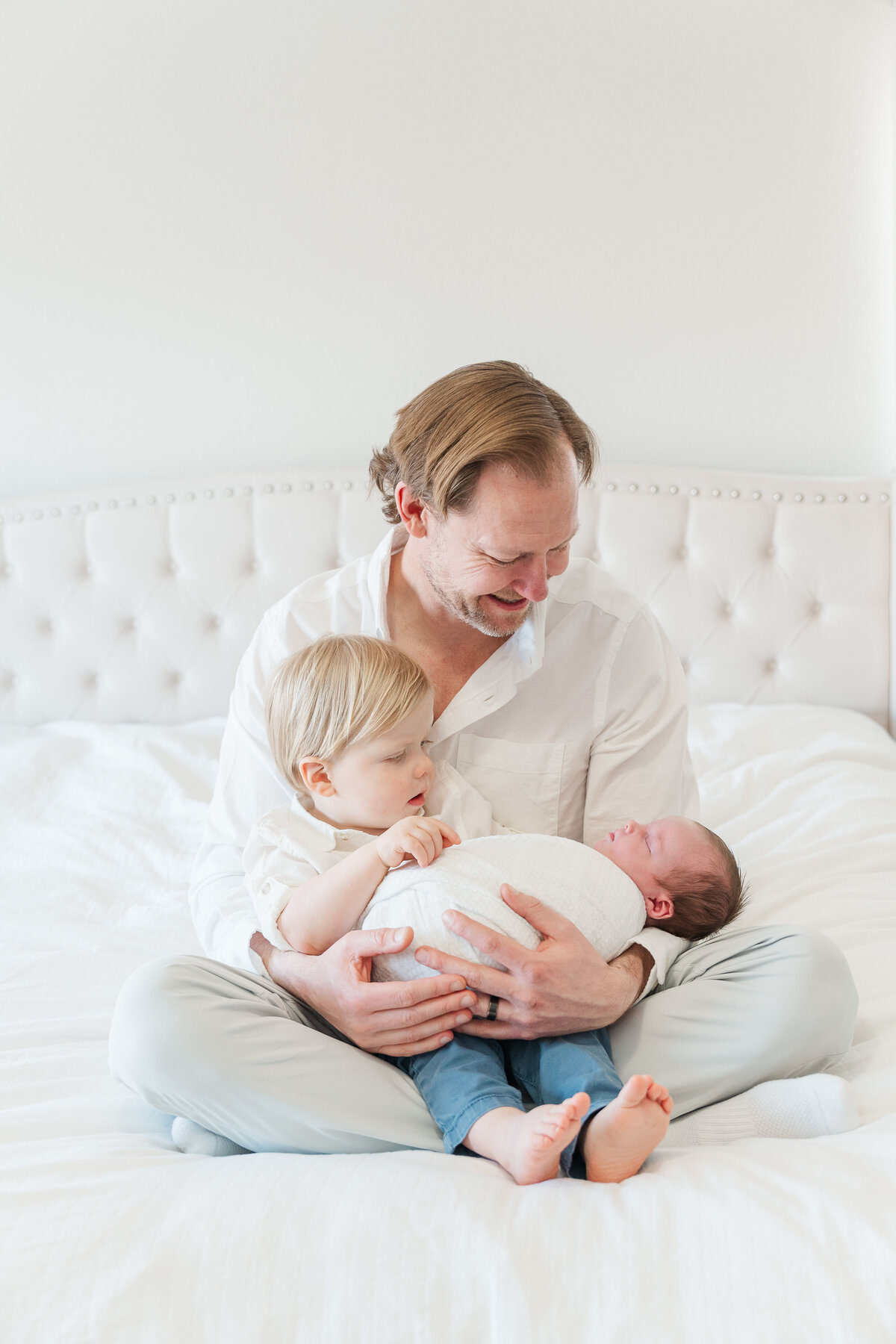 Light and neutral baby boy in home lifestyle newborn photos colorado elena spraguer photography 0012