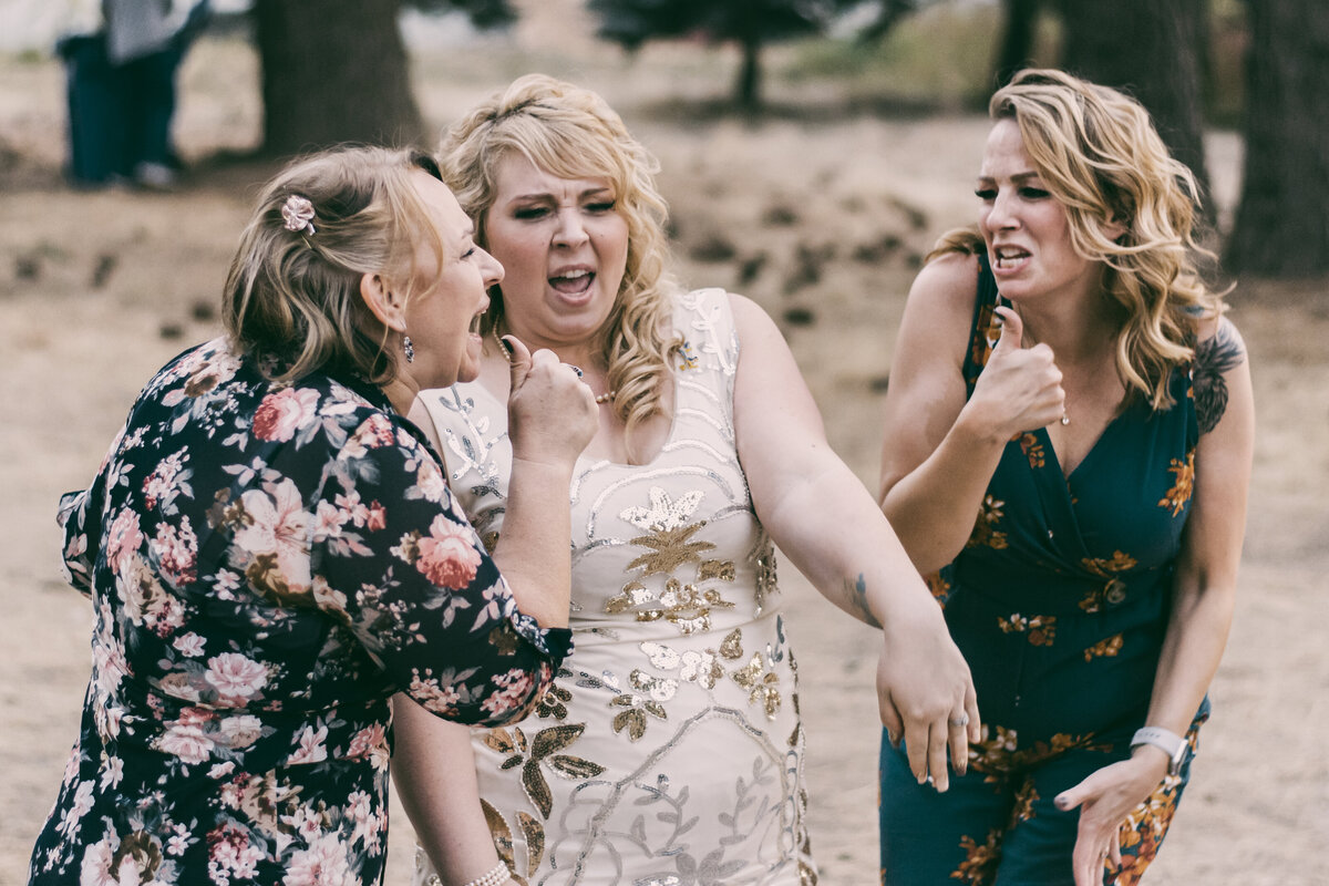 Bride-sings with friends at a wedding in Big Sur. Photo by 4Karma photography