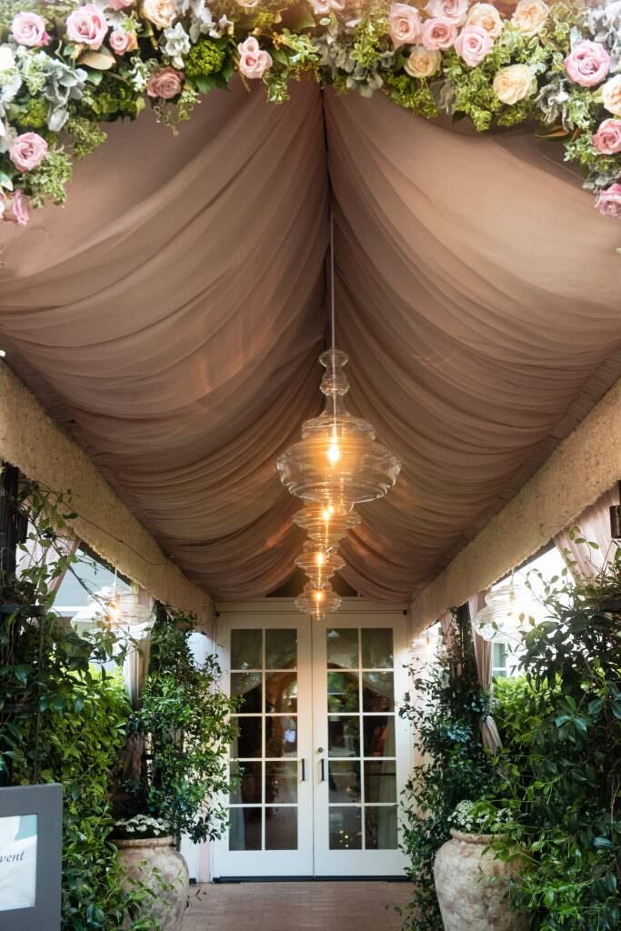 Chandeliers hanging from an awning