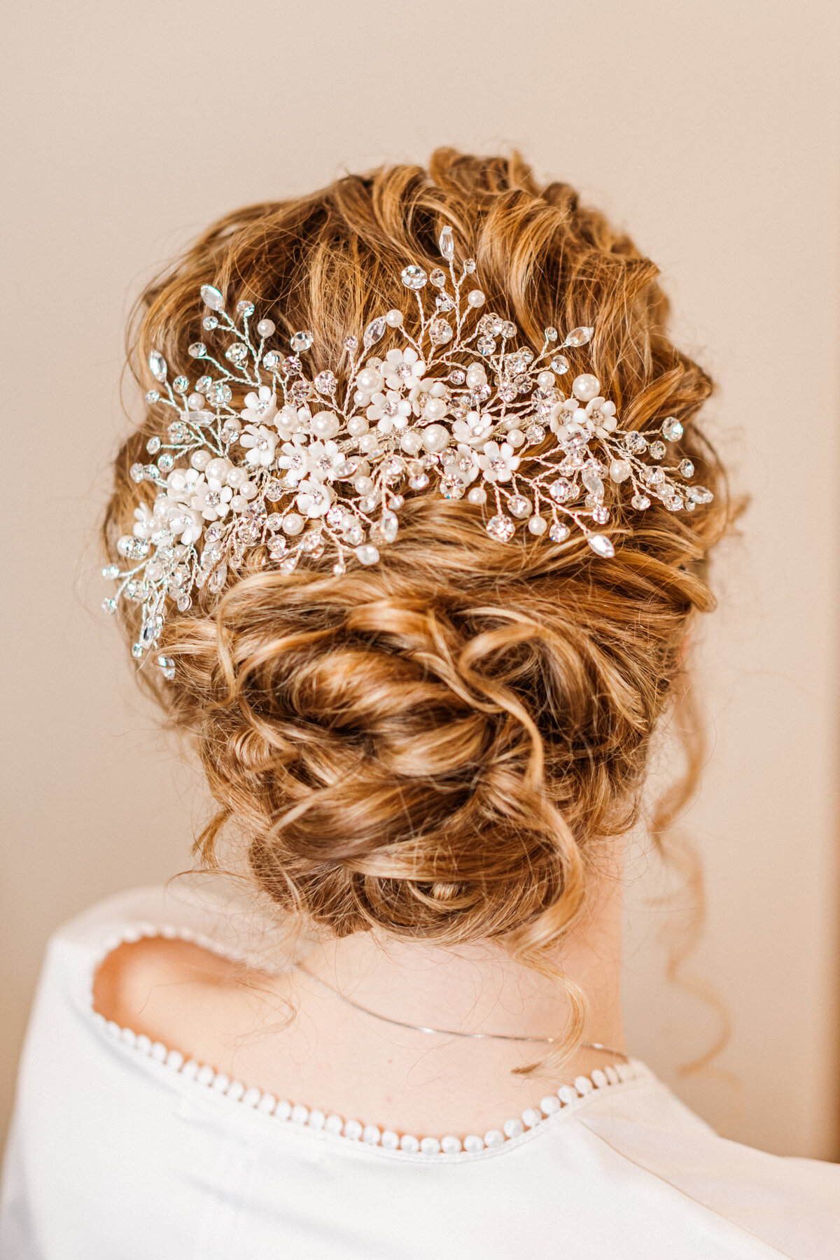Wedding updo by Kayla Walters Hair and Makeup on site bridal beauty