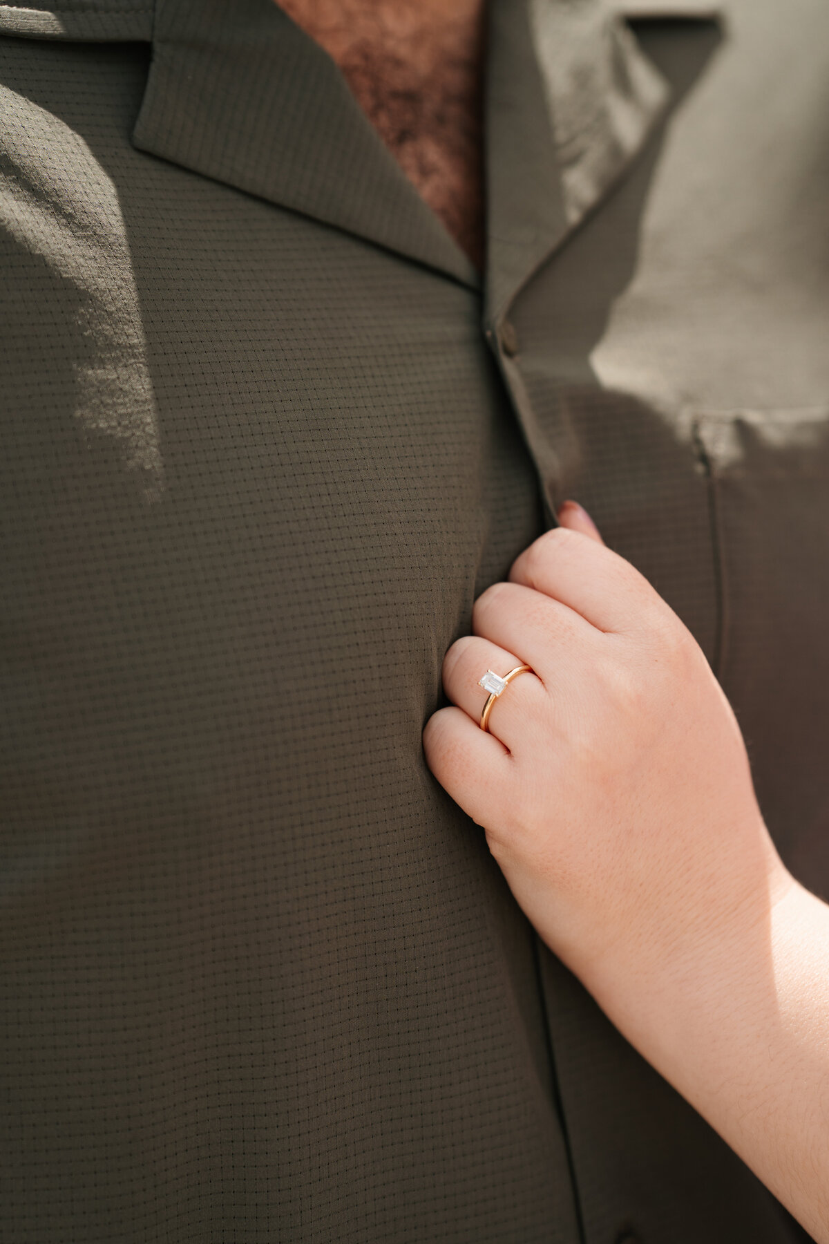 Candid moment between engaged couple at Lynch Park by Danielle Littles Photography