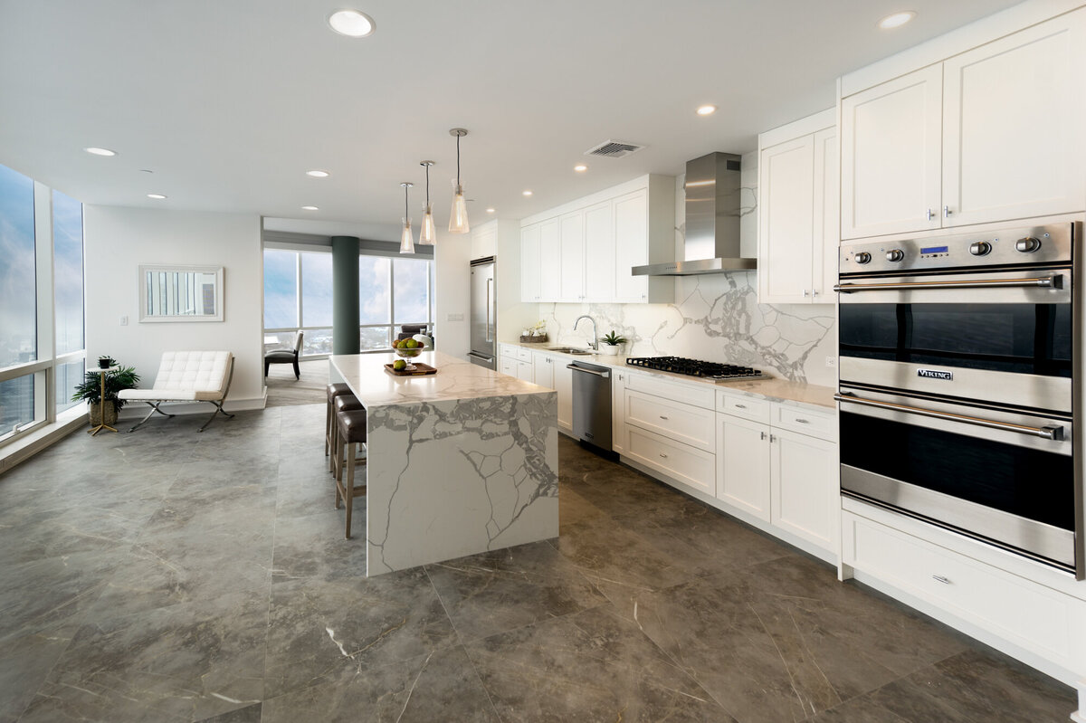 kitchen with white and marble accents