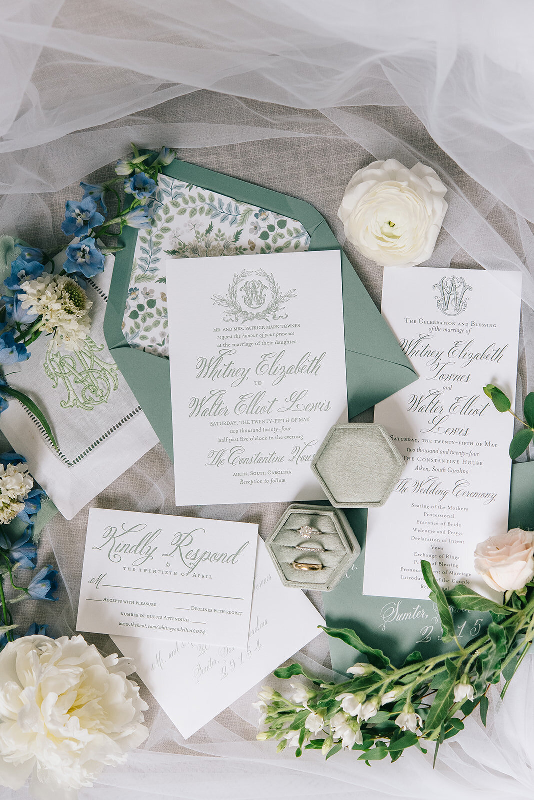 Wedding invitation flatlay with blue and white florals designed by Abby Grace Florals at Greenville SC wedding