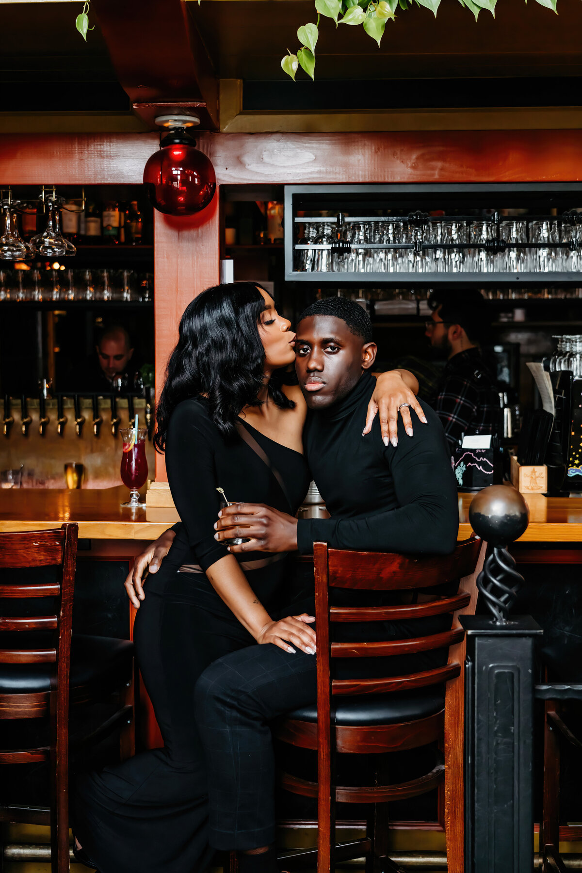 an african american couple enjoying a drink inside a tacoma bar, McMenamin's