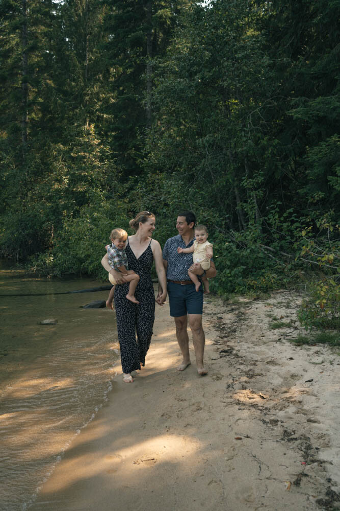 An adventurous couple hikes through scenic Washington landscapes, capturing an family session filled with exploration and love.