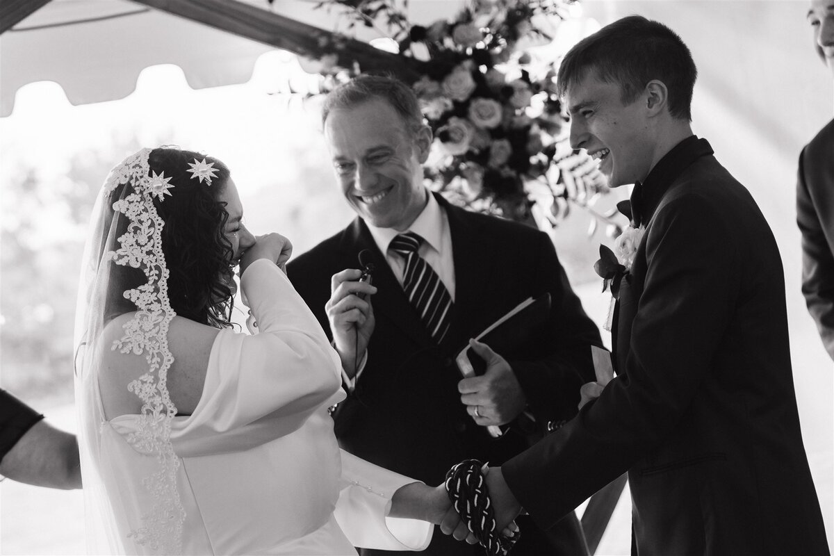bride getting emotional during wedding vows 