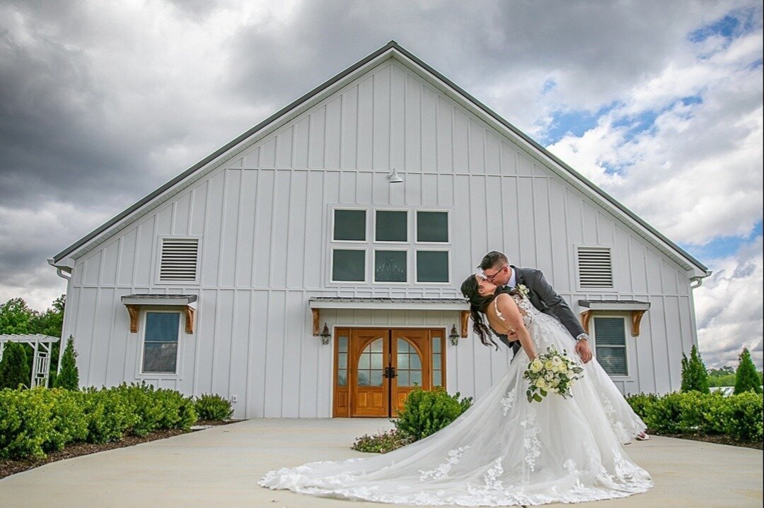 Doors-Bride-Groom-Kissing-Patio-The-Legacy-at-Willow-Pond.JPG