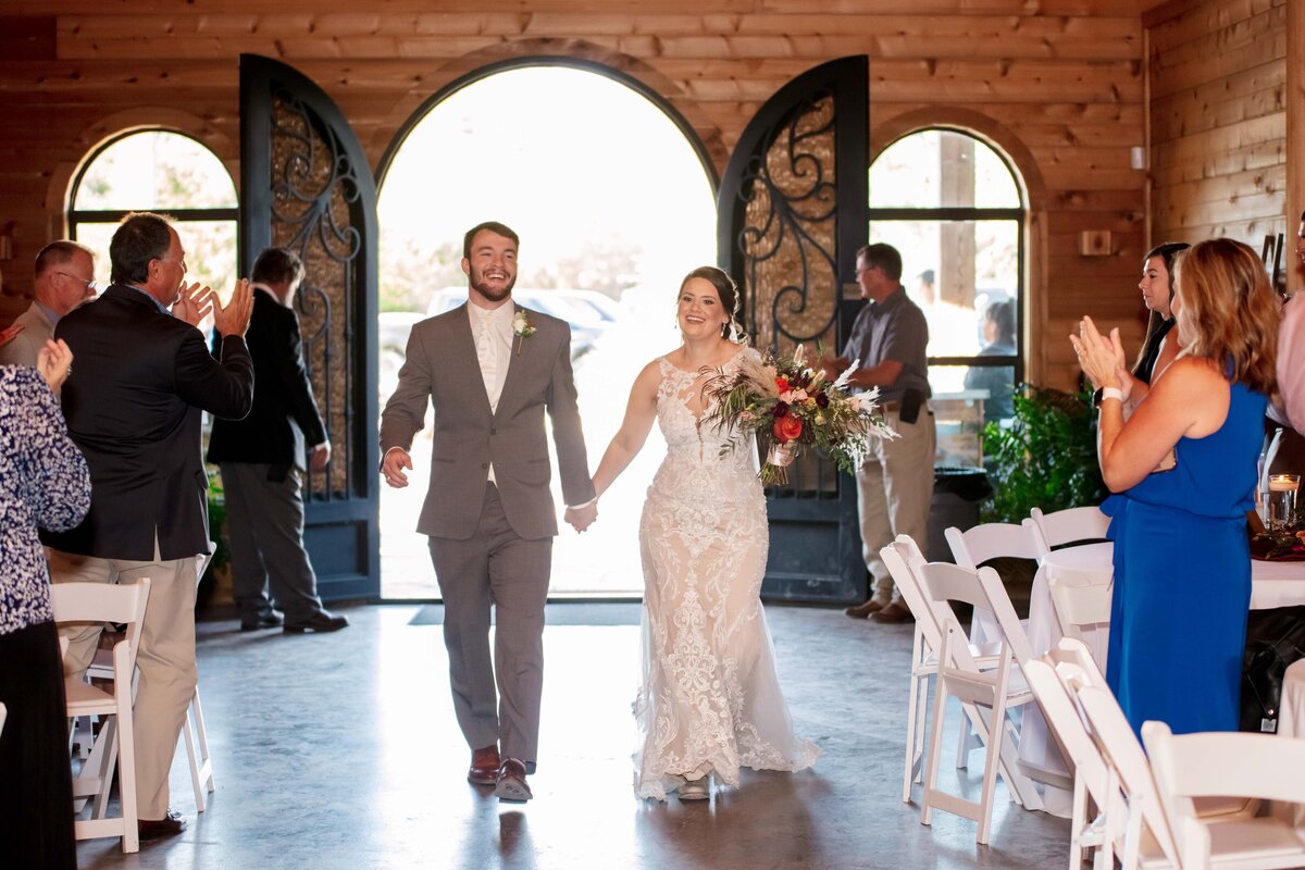 bride and groom reception entrance at Geronimo Oaks