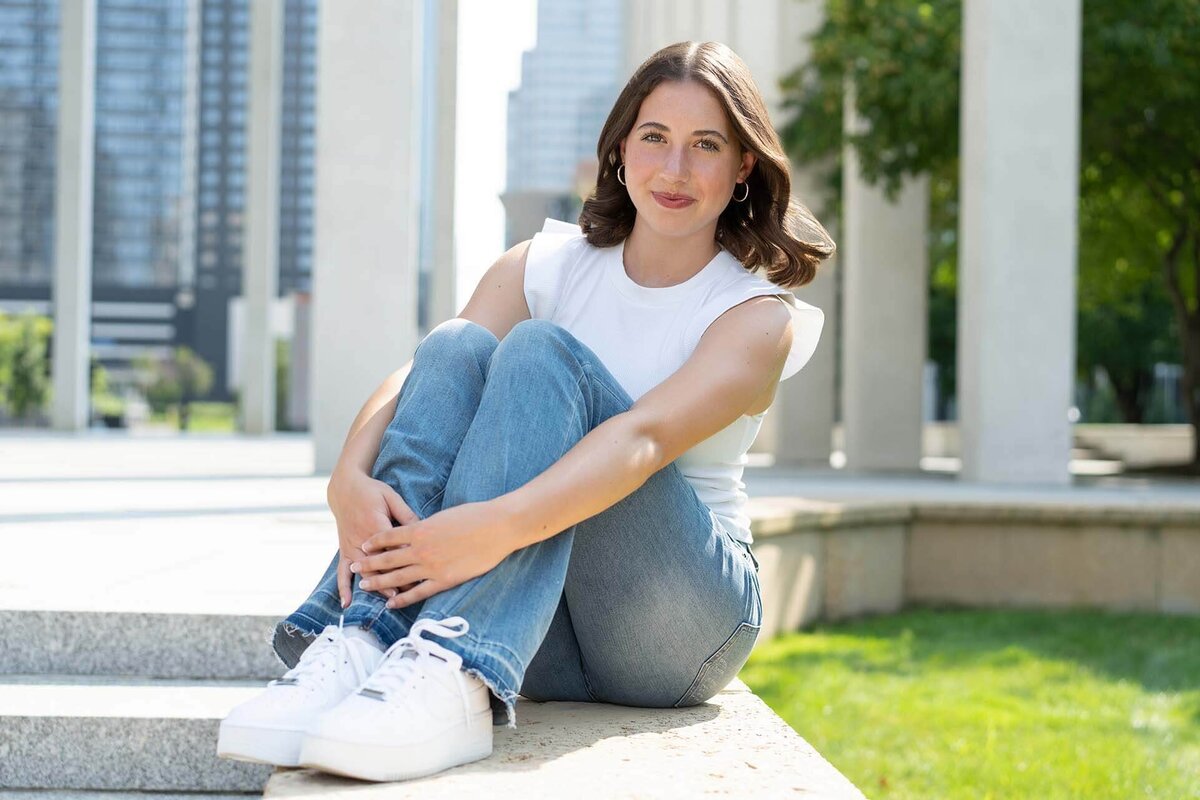 seniro-girl-in-white-by-city-pillars