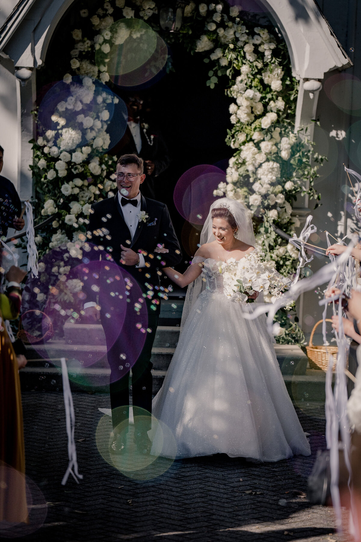 Marie + Tyler Elegant Disney weddings---  14---Ceremony exit bubbles