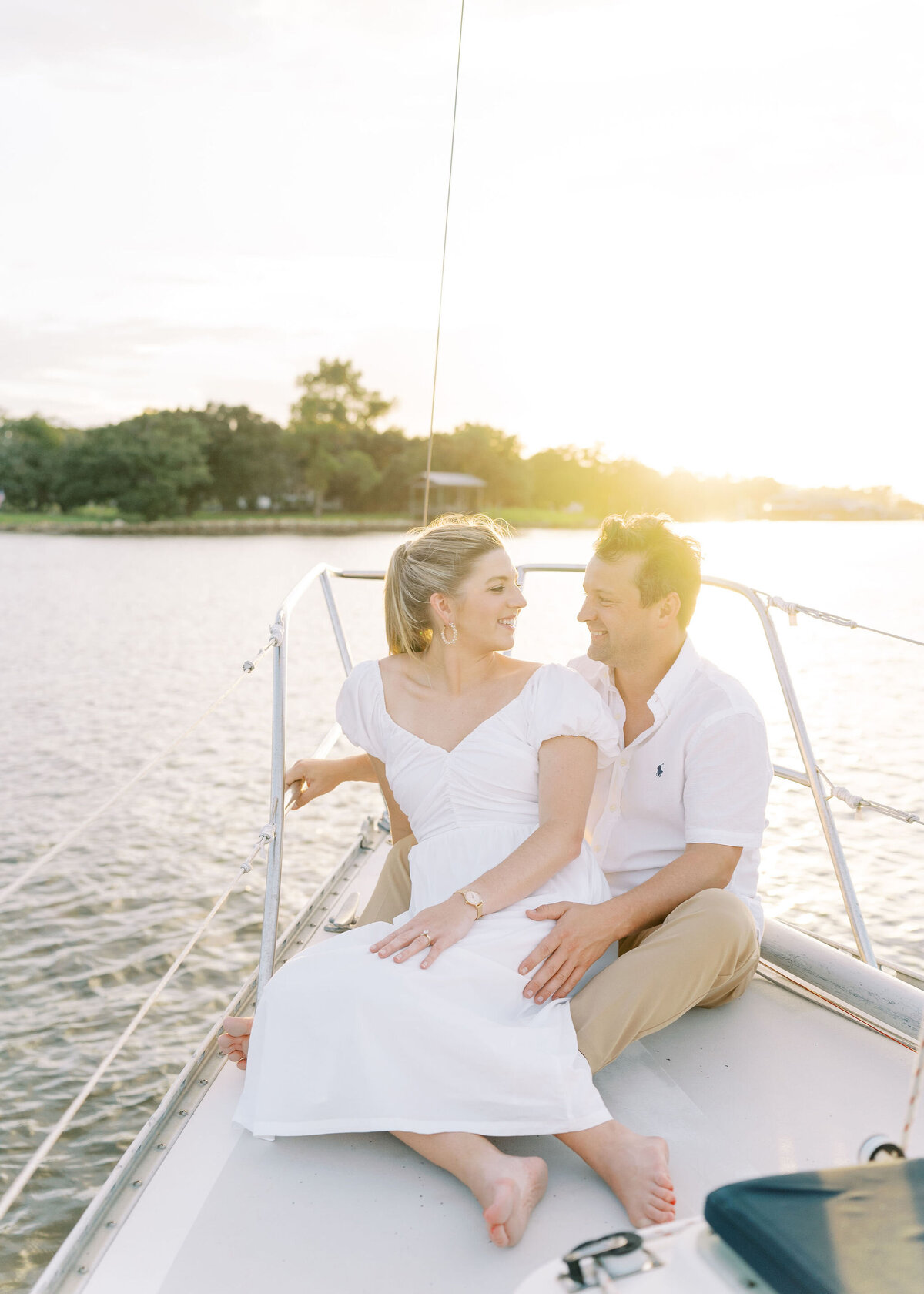 engaged couple looking into each other's eyes