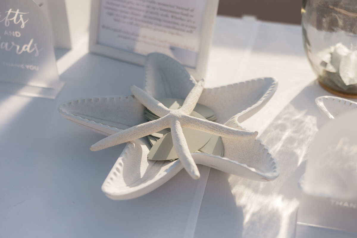 Wedding welcome table details at Hilton Beachfront Resort Santa Barbara