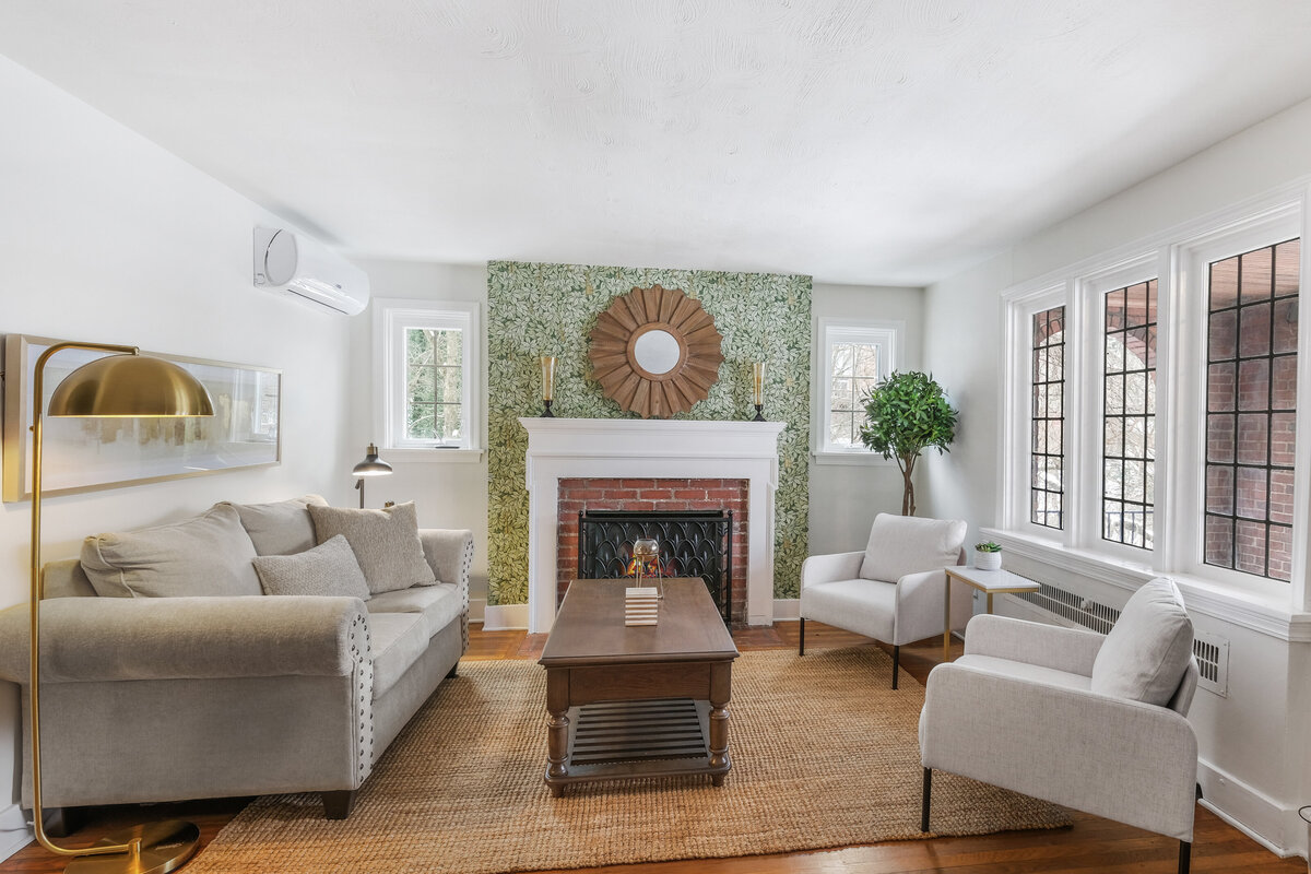 Professionally staged living room designed to maximize home value and buyer appeal