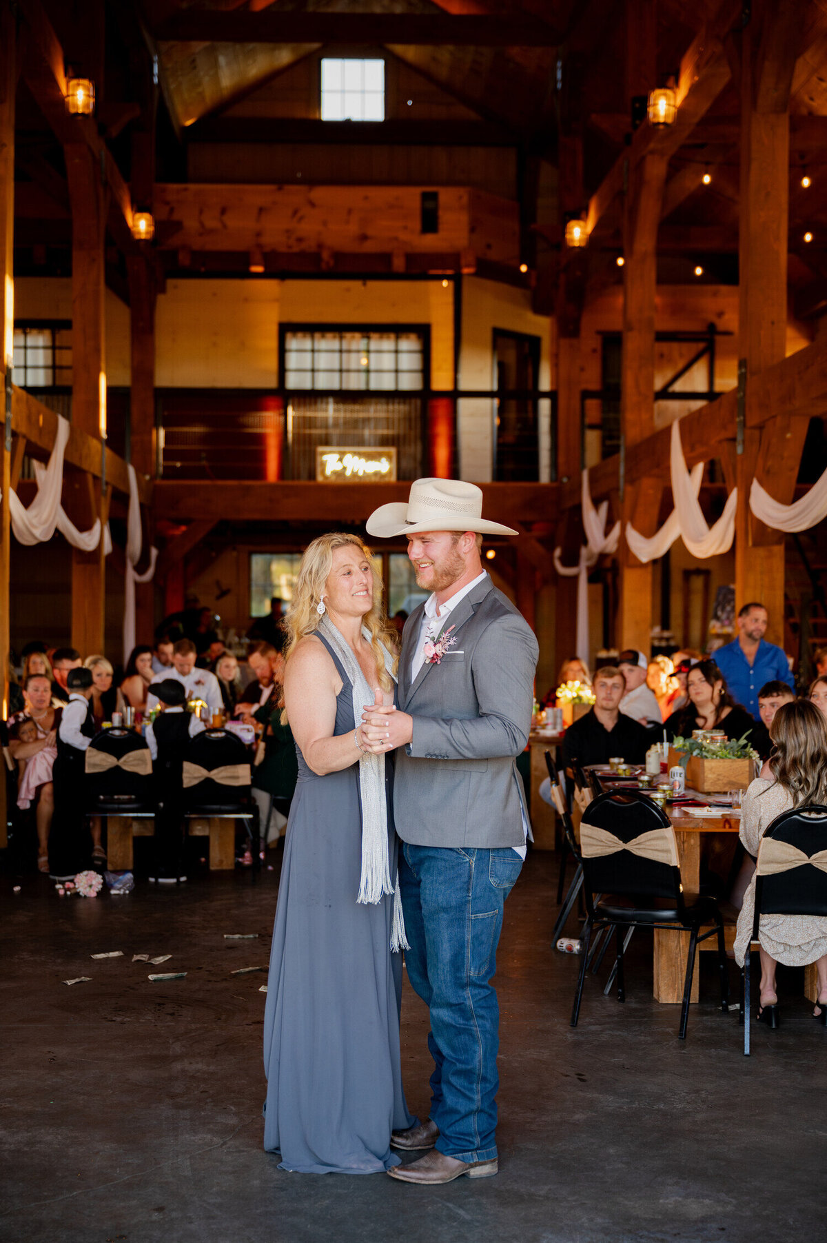 The groom shares a dance with his mother during a Fall wedding at Country Meadows Barn in Fort Ann, NY.
