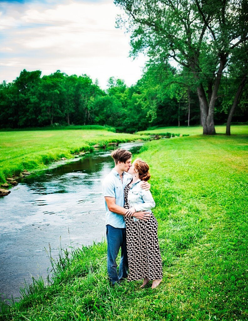 expecting parents by river