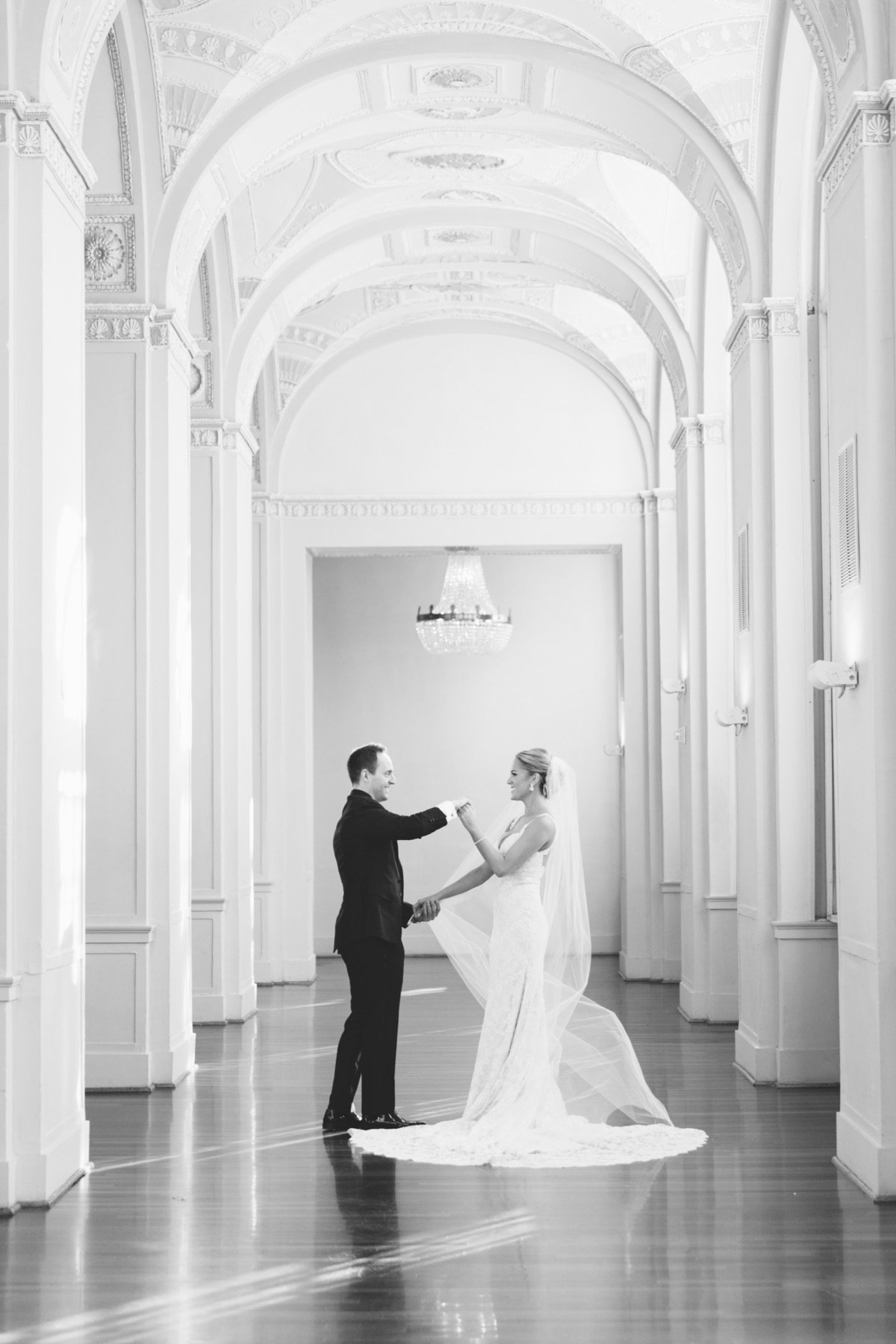 Dance like nobody is watching.  That's what Jack + Tracey did after their emotional first look at the Biltmore Ballrooms in Atlanta, GA.  Photo by Rebecca Cerasani.