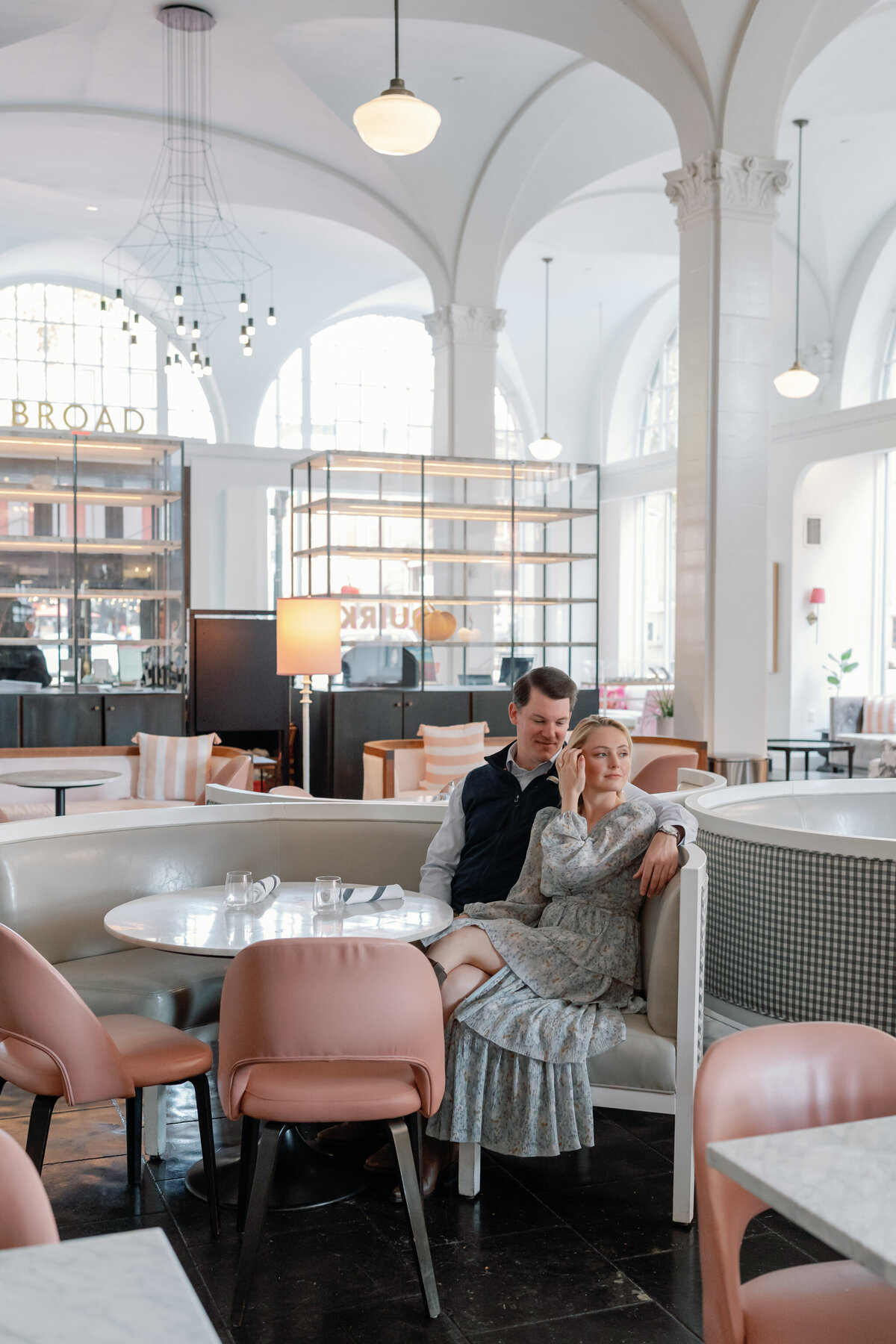 Quirk Hotel Richmond Restaurant Photos | elegant image of couple sitting in the contemporary lobby restaurant in the Quirk RVA Hotel
