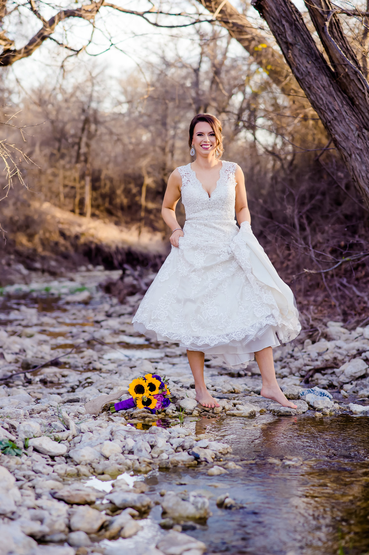 bridal photo in creek