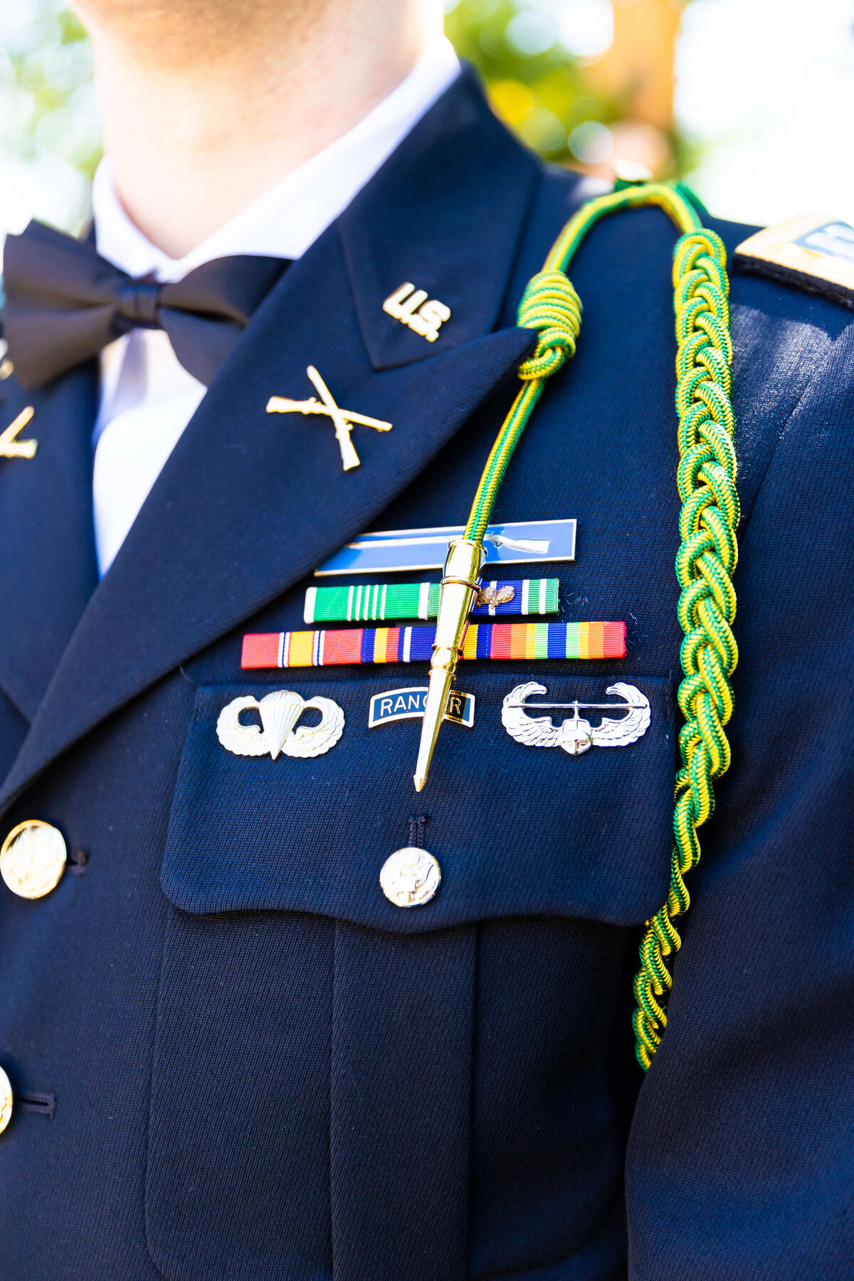 Groom wearing military suit at Fat Bottom Brewery wedding in Nashville, TN