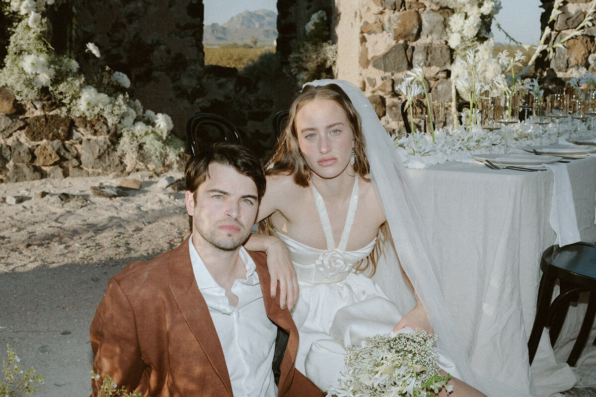 photo of west coast wedding couple at outdoor reception space