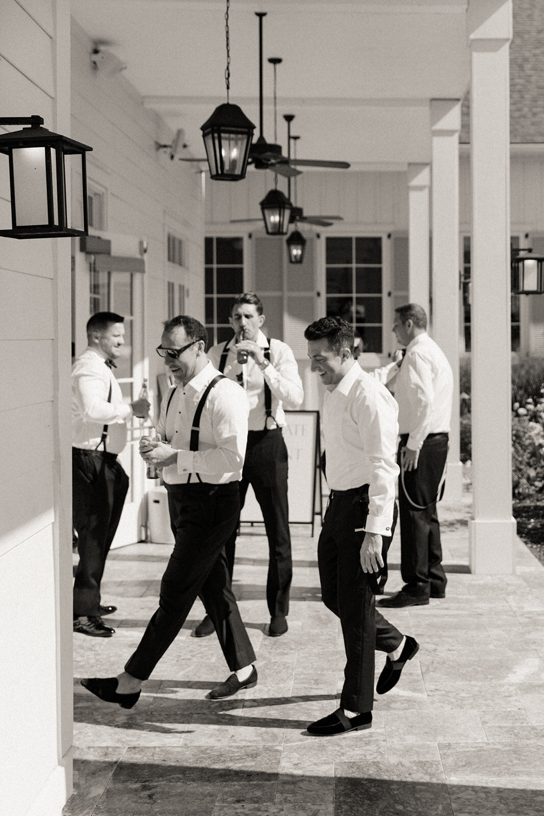 Groomsmen hanging out the morning of a wedding at The Lake House on Canandaigua