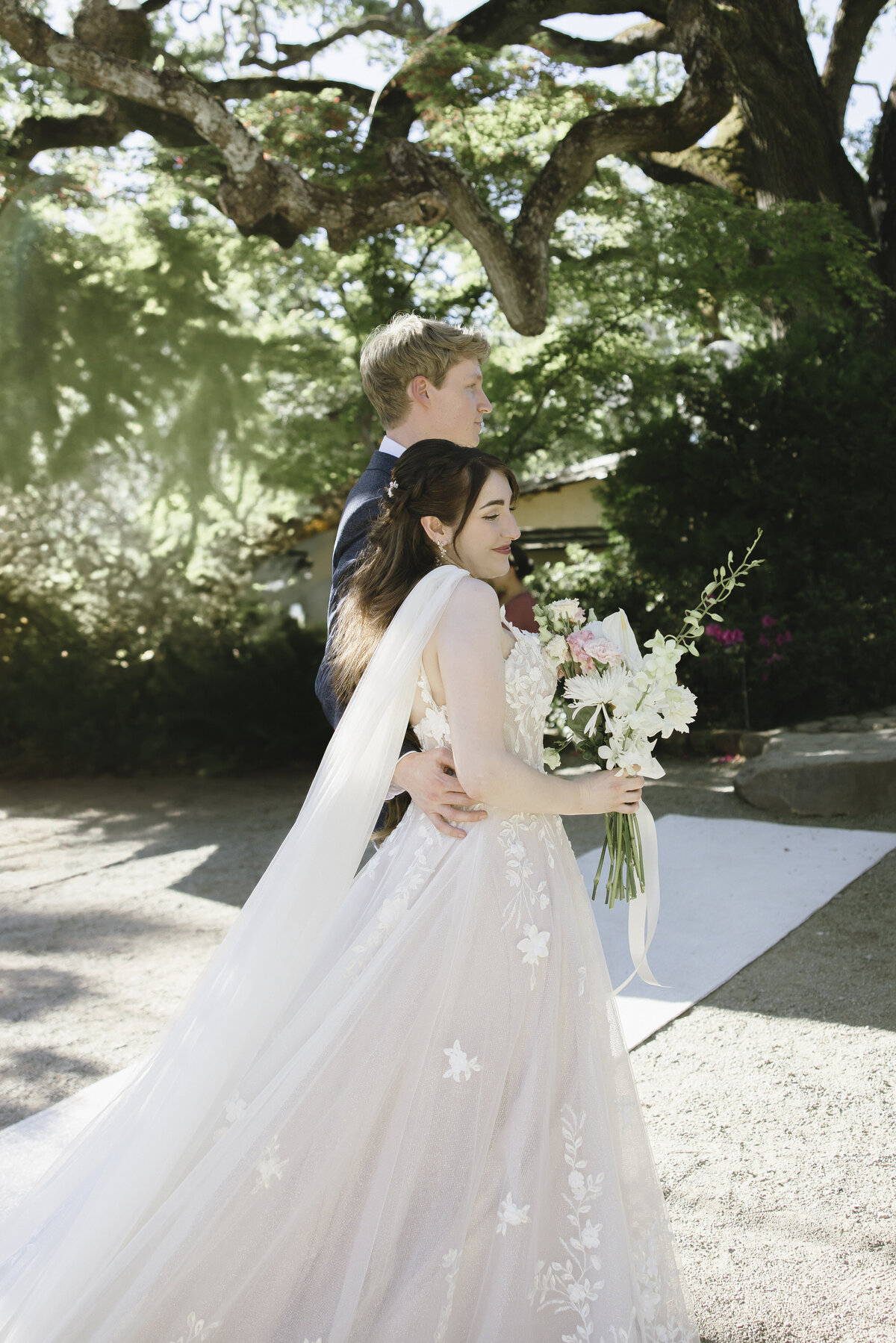 Bride and Groom posing in tea garden