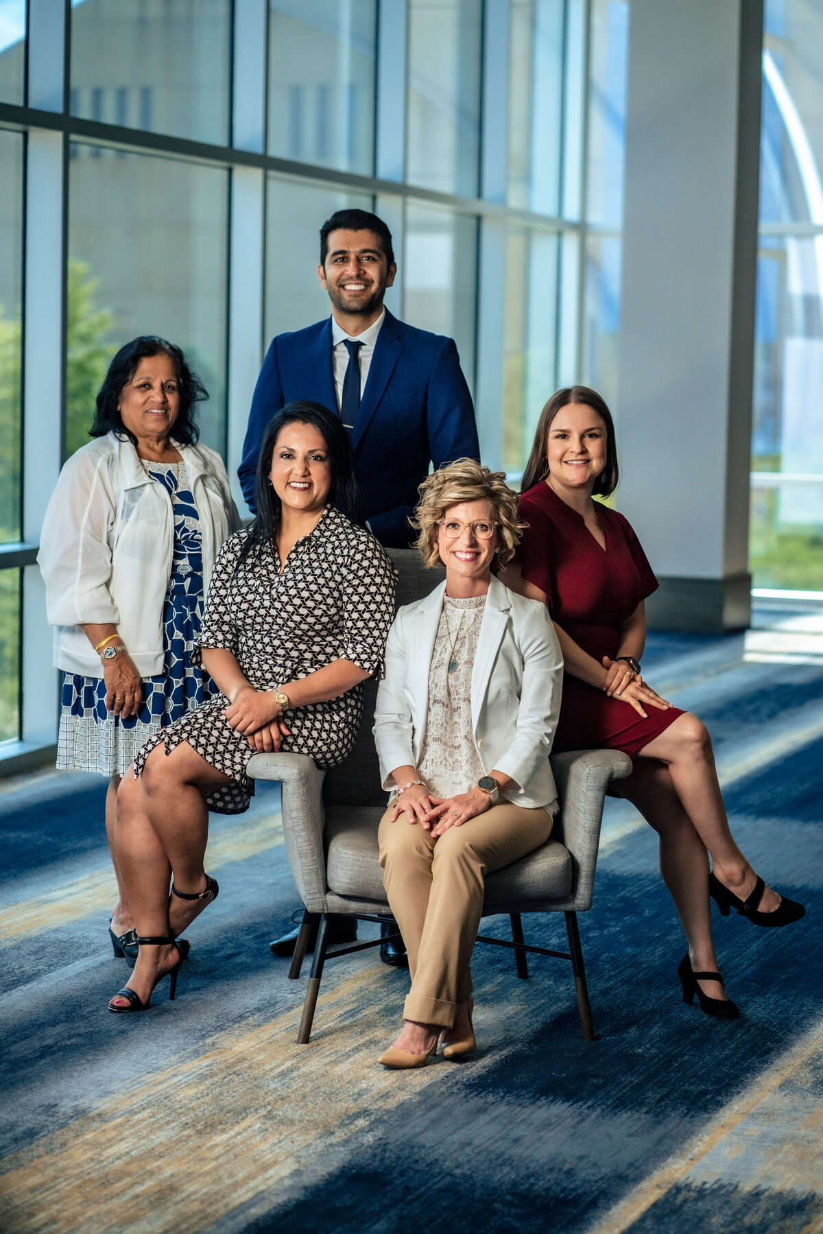 kansas-city-team-group-photography-0003-group-sitting-and-standing-in-office-lobby