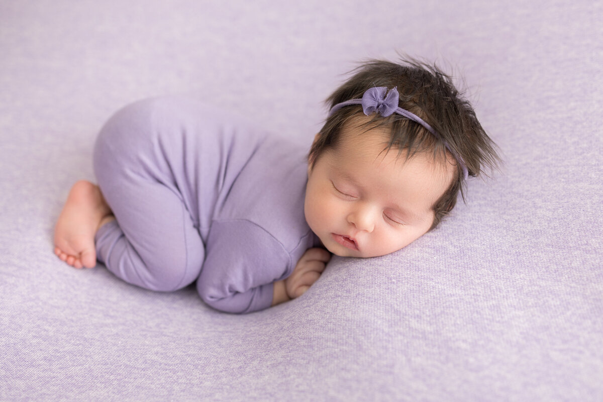 A purple newborn session photographed in Moorestown.