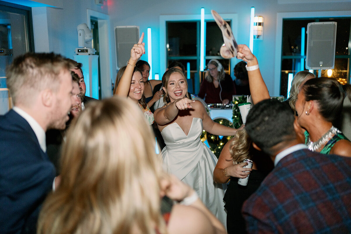 Bride and groom nighttime wedding portrait at Boatwerks Waterfront Venue in Holland Michigan.