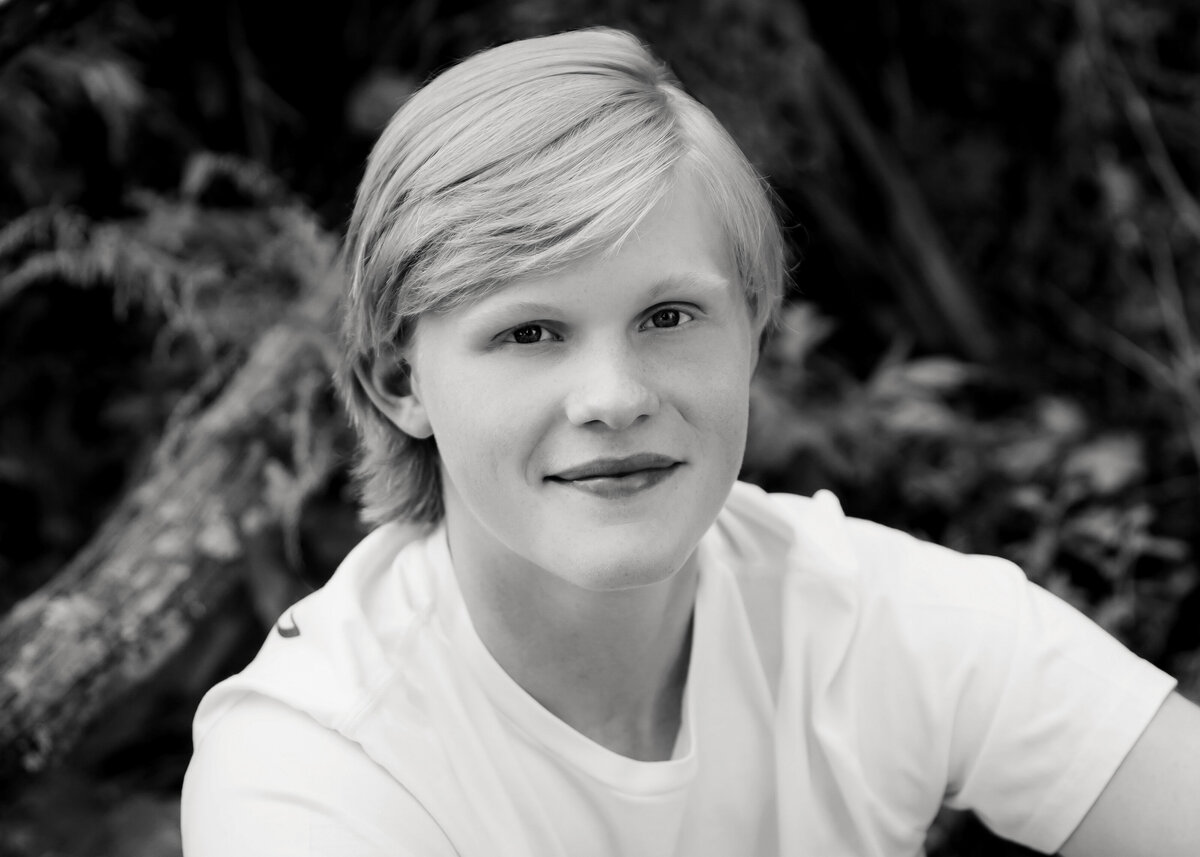 black and white senior portrait of a guy from PalMac