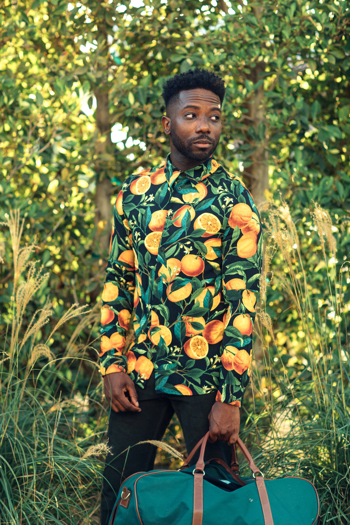 Portrait Photo Of Young Black Man In Fruit Print Long Sleeves Polo Los Angeles