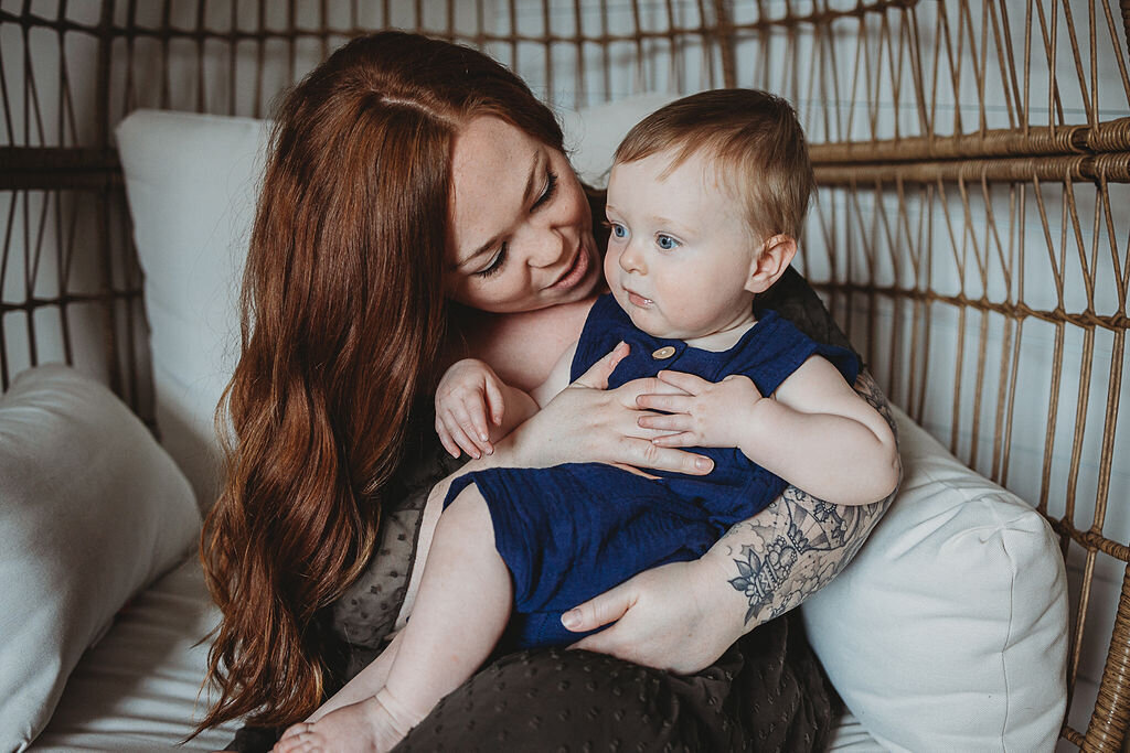 mom holding her son in boston photoshoot
