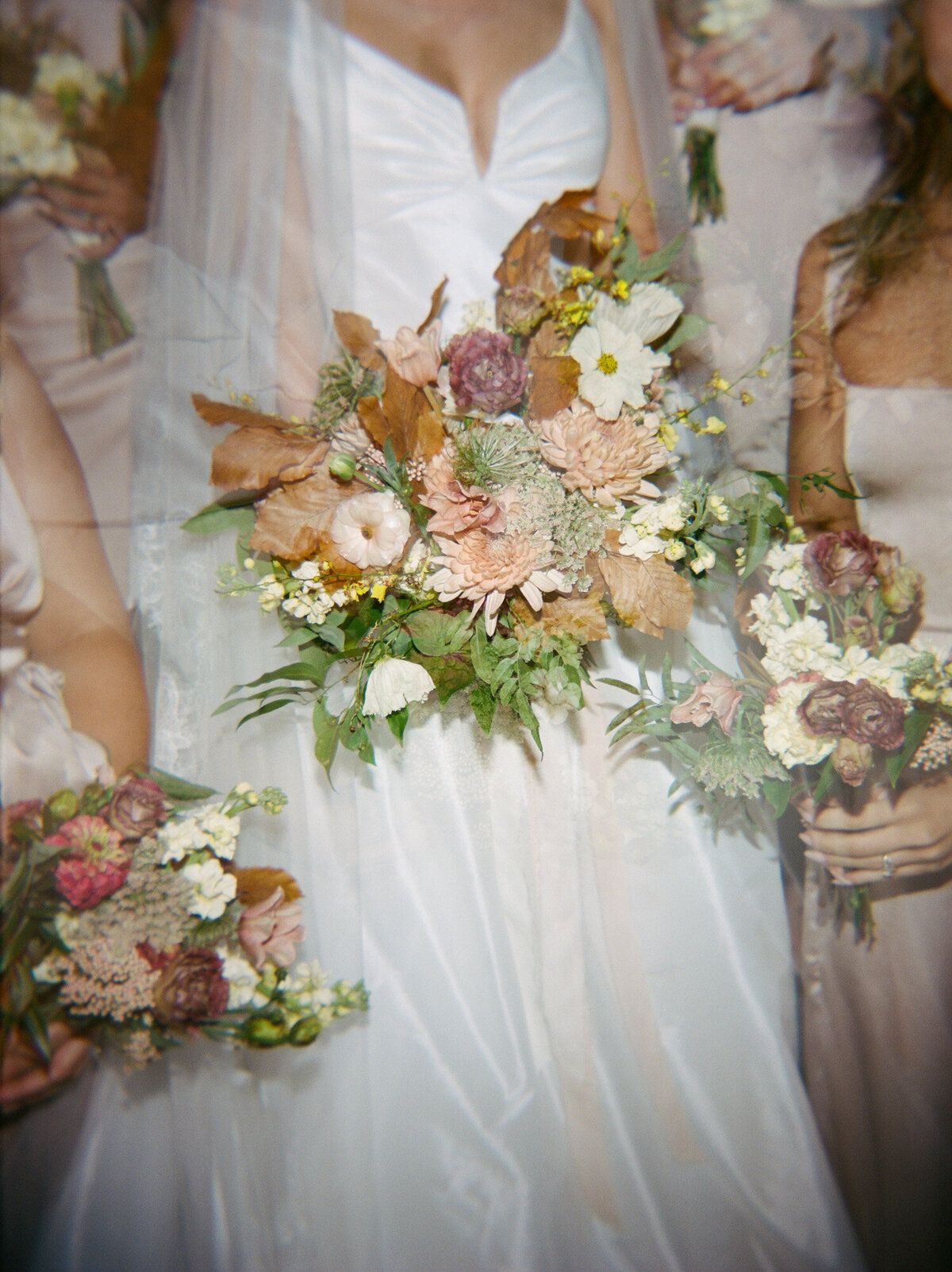 soft film photography of fall bridal bouquets in Detroit, Micihigan